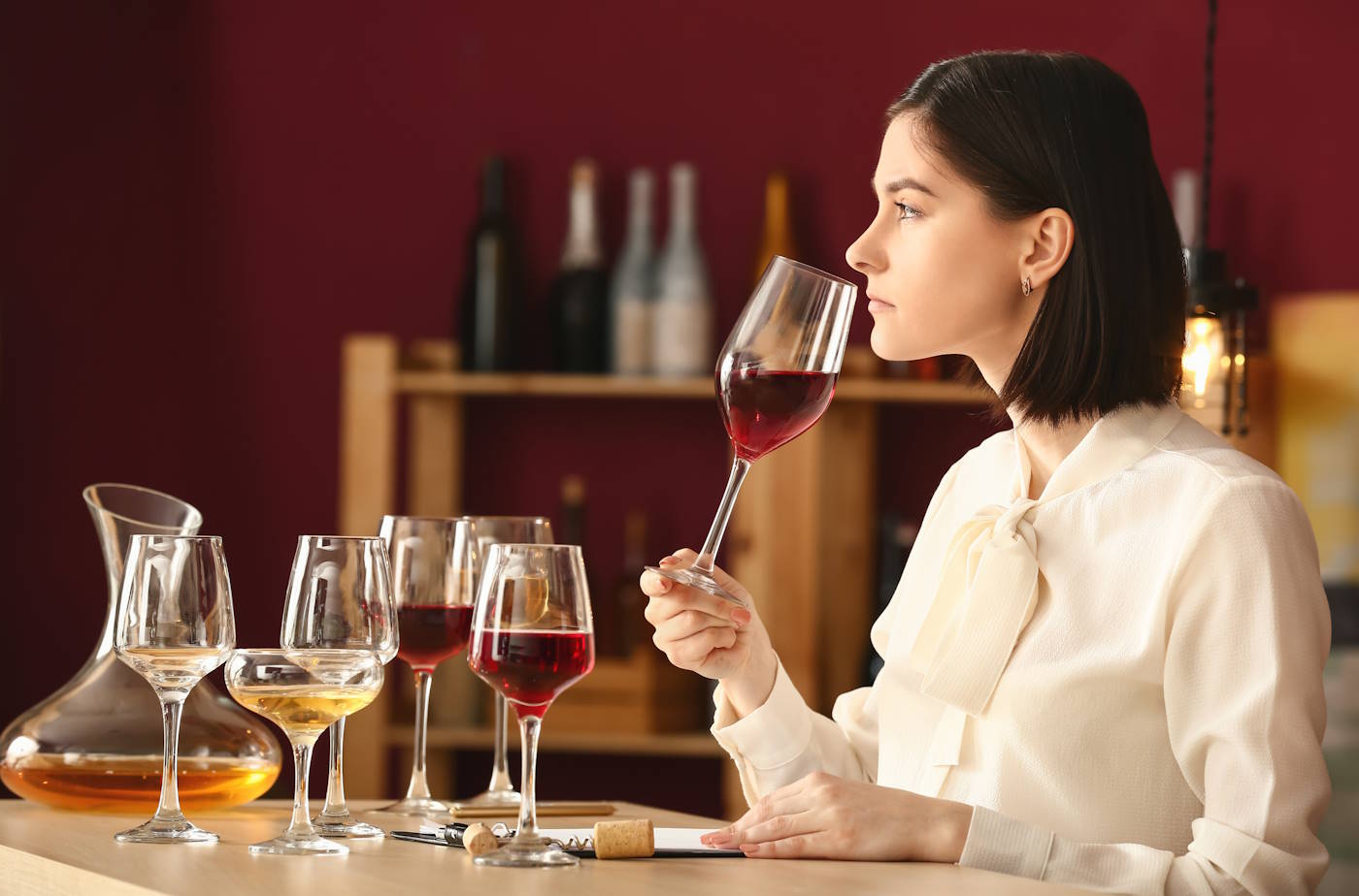 Woman tasting wine